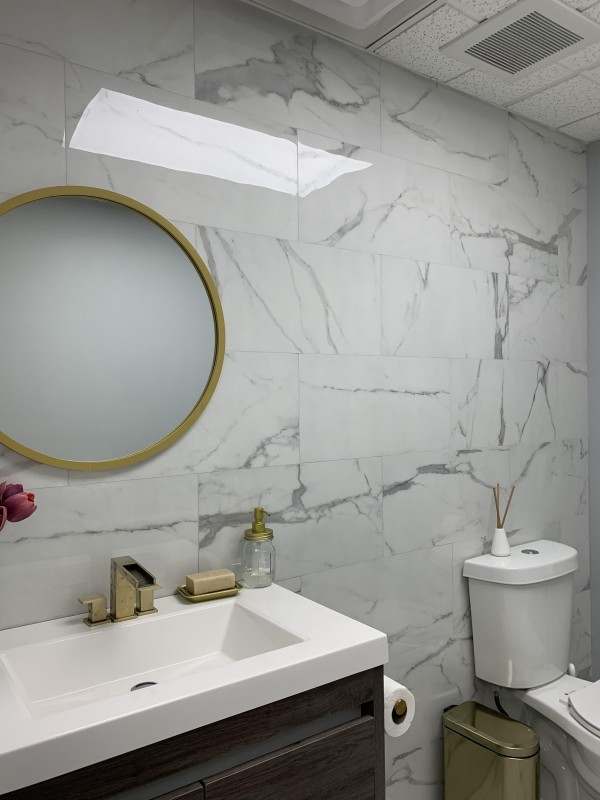 Stylish Bathroom with Marble-Look Tiles